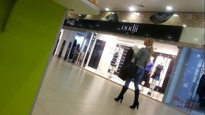 Cool chick in the supermarket.